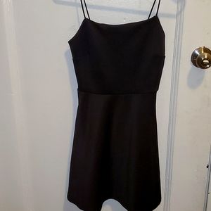 This dress was worn once, a size S, color Black.